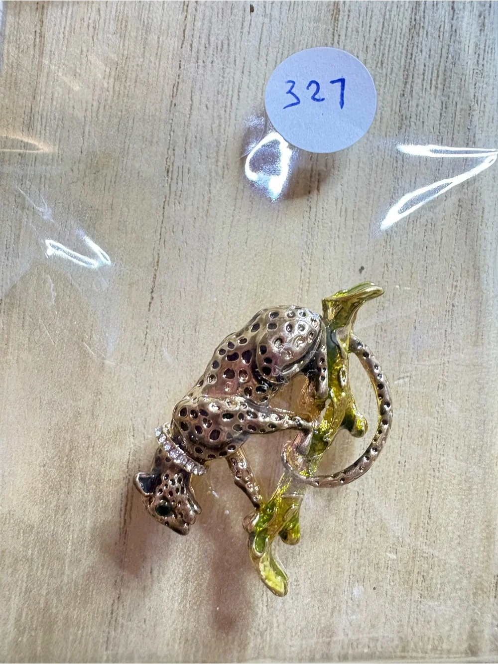 Gold-Tone Leopard Brooch with Green Accent on Branch